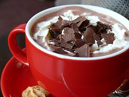 mug of chocolate with whipped cream and chocolate shavings
