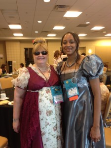 Laurie Alice Eakes in a burgundy and floral ball gown. We went to our book signings in these dresses.